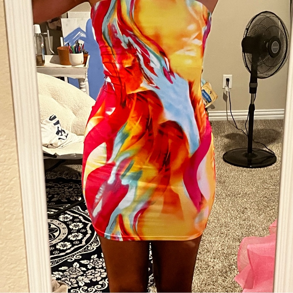 Mini party dress, only worn once, rubber around top to keep it up.